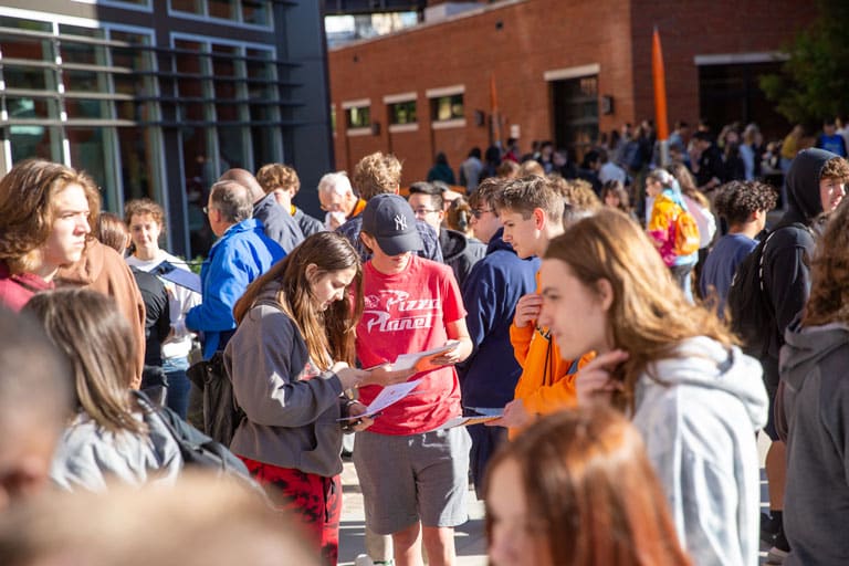 Students check out booths in the ZEC courtyard