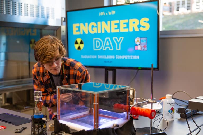 NE graduate student demonstrates radiation during Engineers Day. 