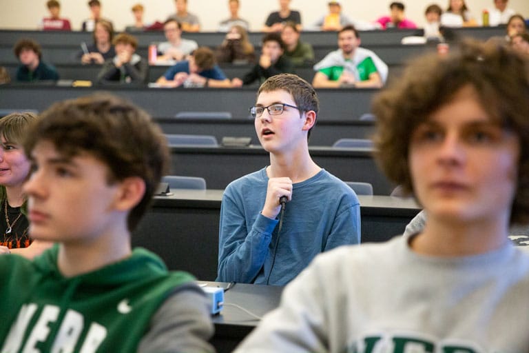 Student participates during Quiz Bowl