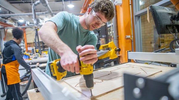 Student works in the ICS wood shop