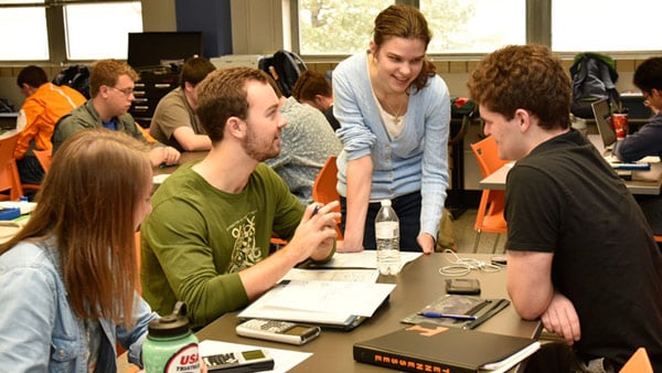 Students working on project in an Honors Program class