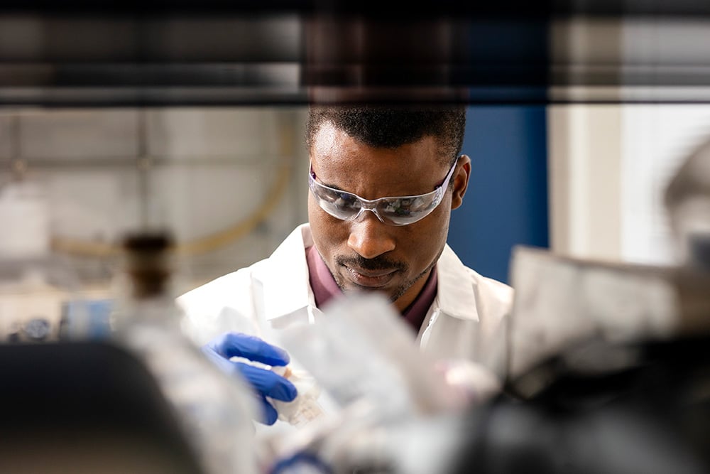 CBE graduate student working inside of a Dougherty Lab