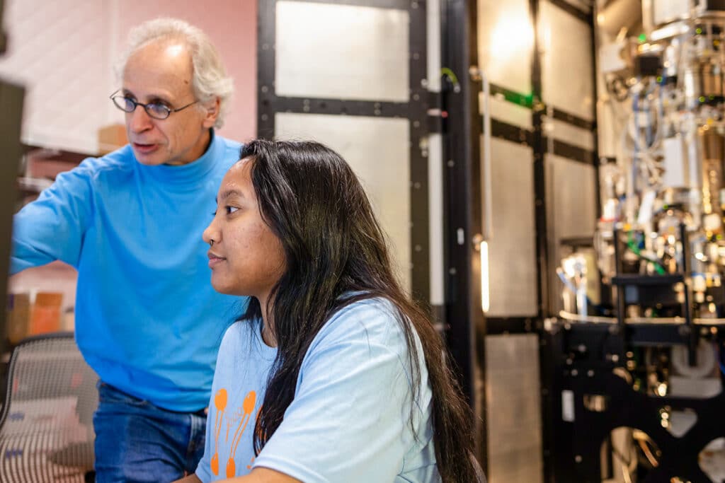 Materials science and engineering student works with faculty member in an IAMM lab. 