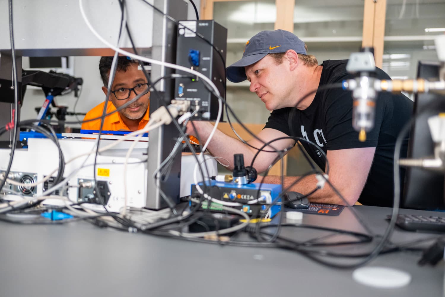 Senior Research Associate Gabriel A. Goenaga-Jiménez works with post-doctoral researcher Adam Imel in a lab in Zeanah Engineering Complex