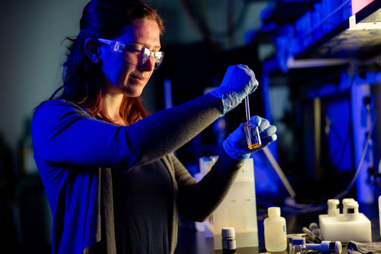 A graduate student works in the Polymer Characterization Laboratory