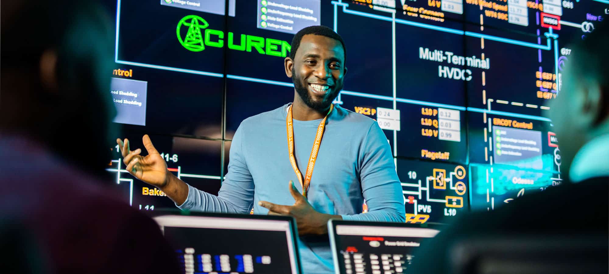 Students work in the Grid Visualization Lab inside the Min H. Kao Department of Electrical Engineering and Computer Science