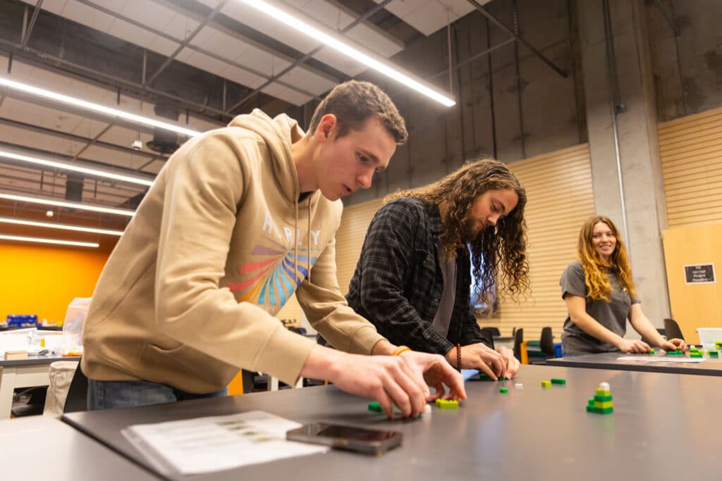 Engineering students compete with each other in a lego building competition during Engineering Day at the Zeanah Engineering Complex