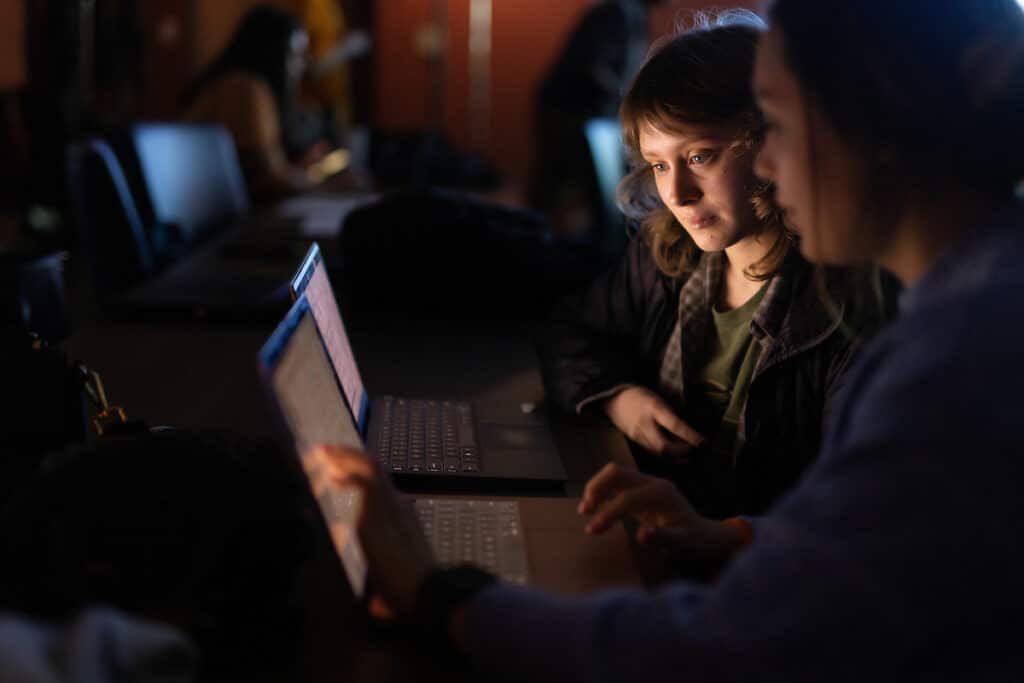 Undergrad students work on community engagement research in the Grid Control and Visualization Lab for the Center for Ultra-Wide-Area Resilient Electronic Energy Transmission Networks (CURENT)