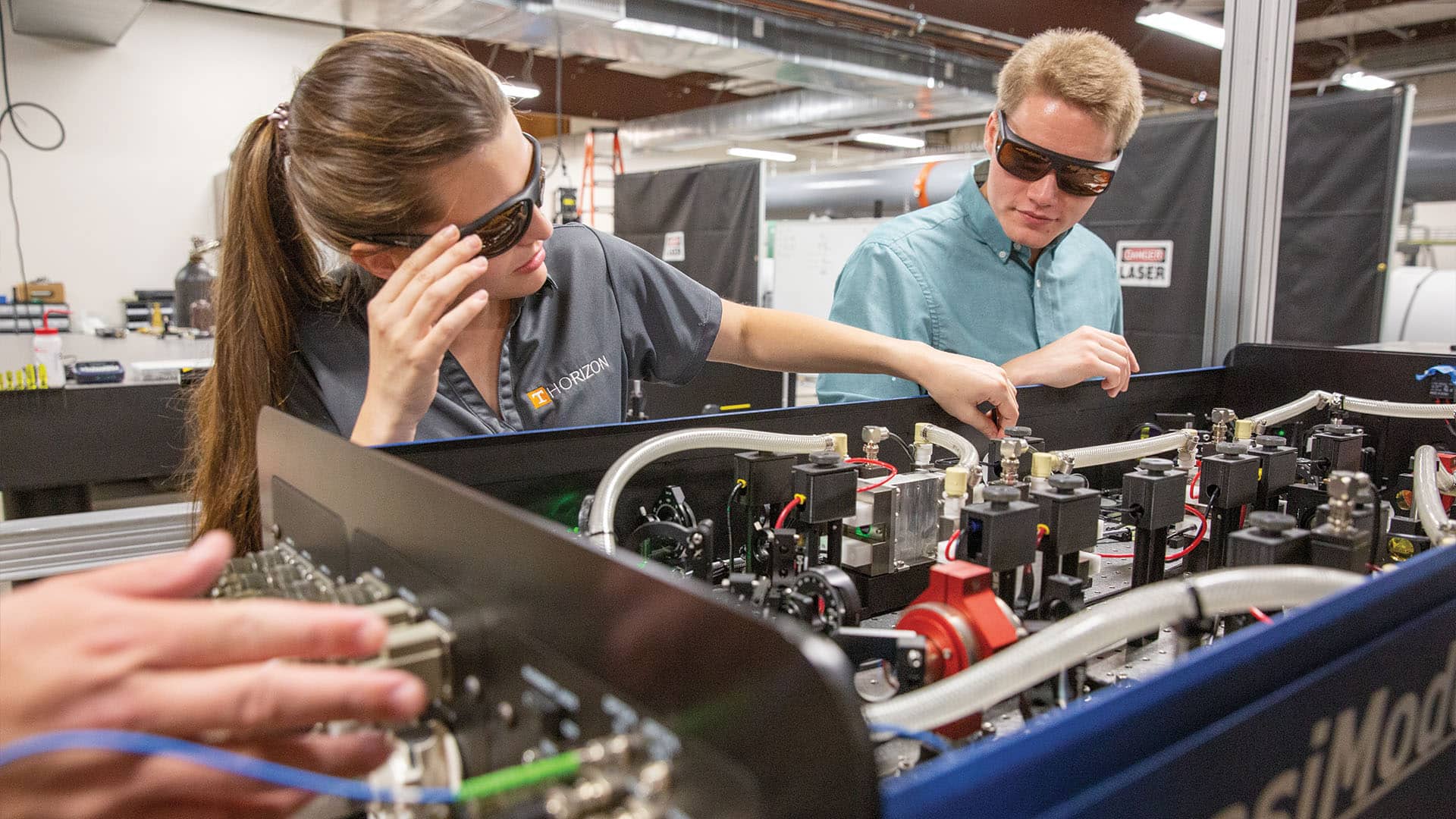 Two students work within UTSI's Horizon Lab. 