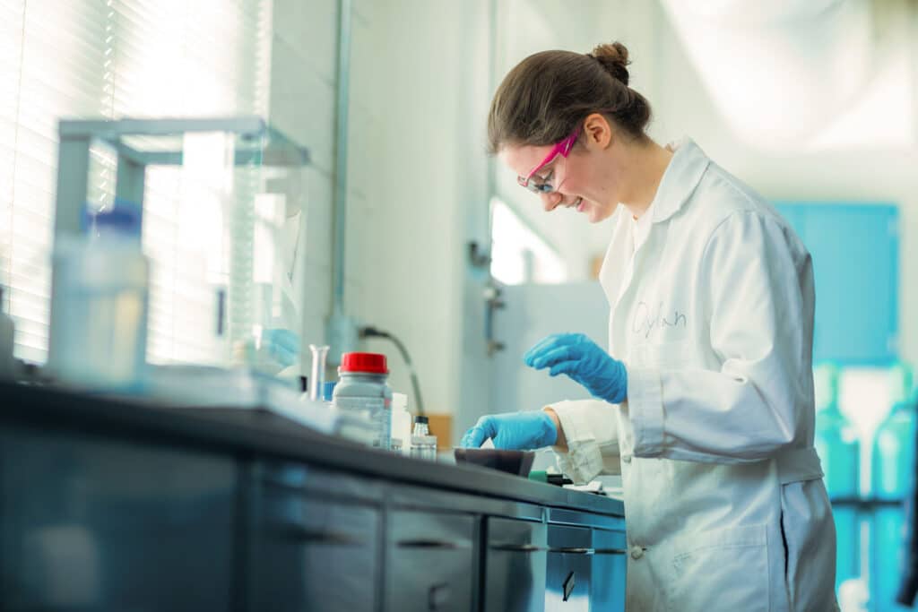 Student in chemical and biomolecular engineering lab.