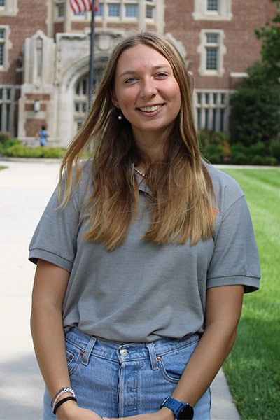 Neela Baker standing in front of Ayres Hall on the University of Tennessee campus
