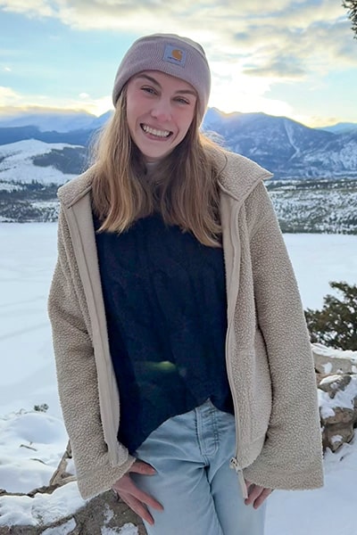 Nora Daugherty standing in the snow