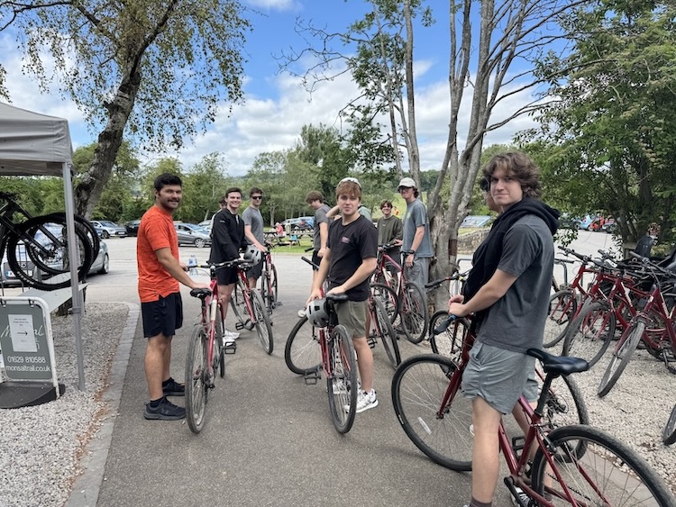 students from Engineering in London program riding bikes
