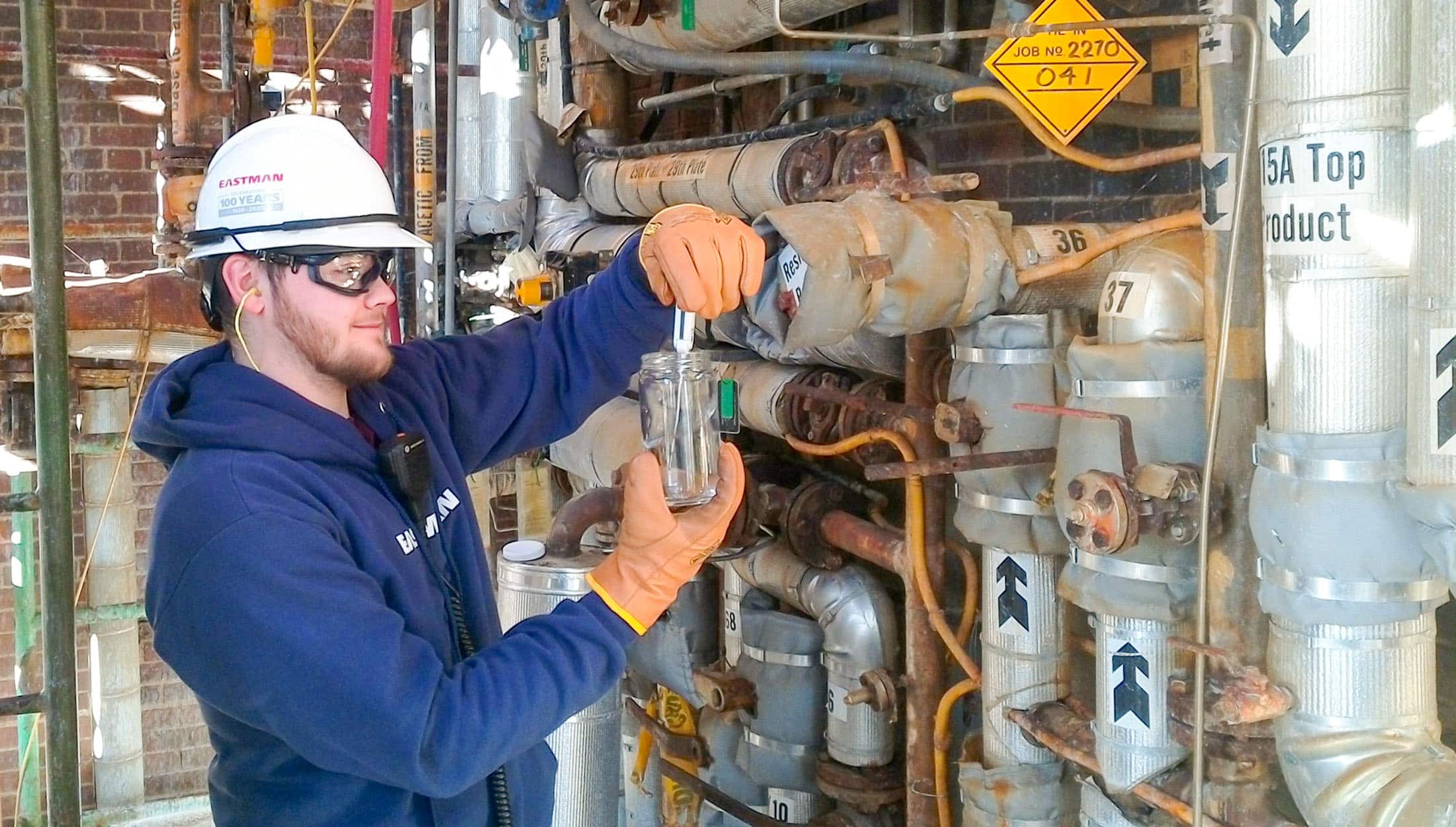 Jeff Greer works on testing a chemical while on assignment at Eatman