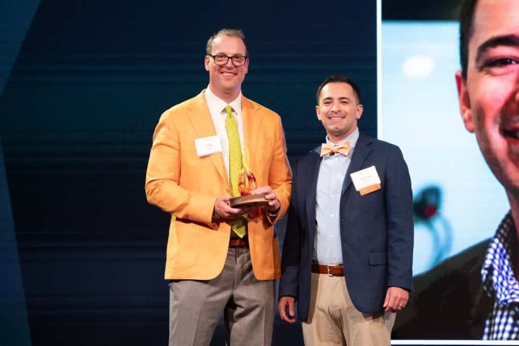 Michael Gomez accepts award at the Alumni Awards Gala.