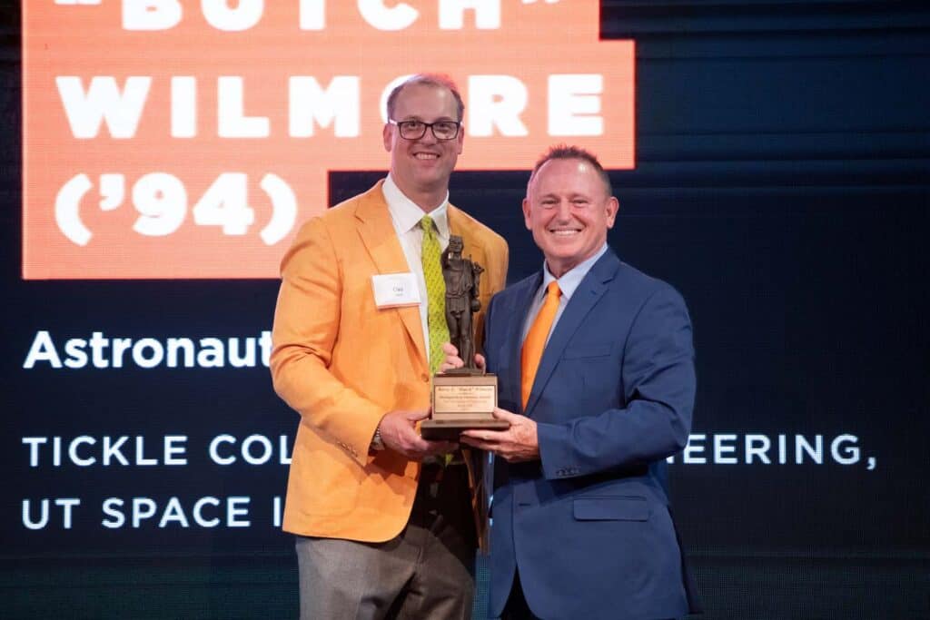 Barry Wilmore accepts award at the Alumni Awards Gala