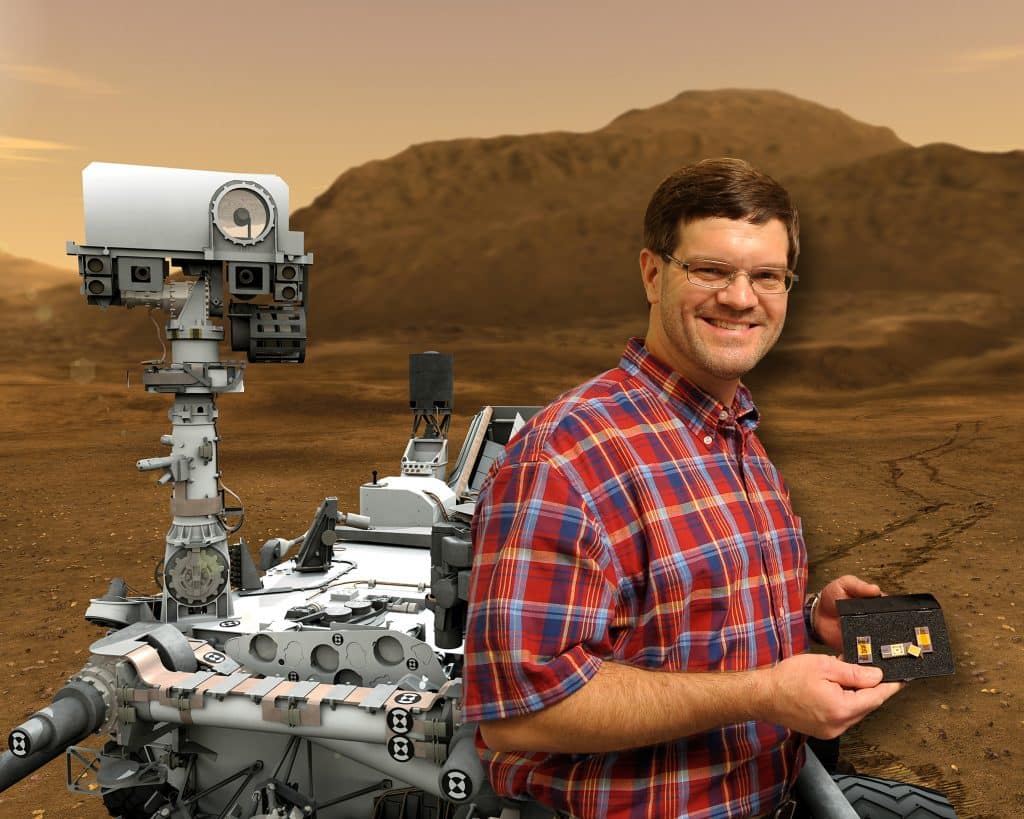 Ben Blalock photoshopped on a background of mars with the mars rover