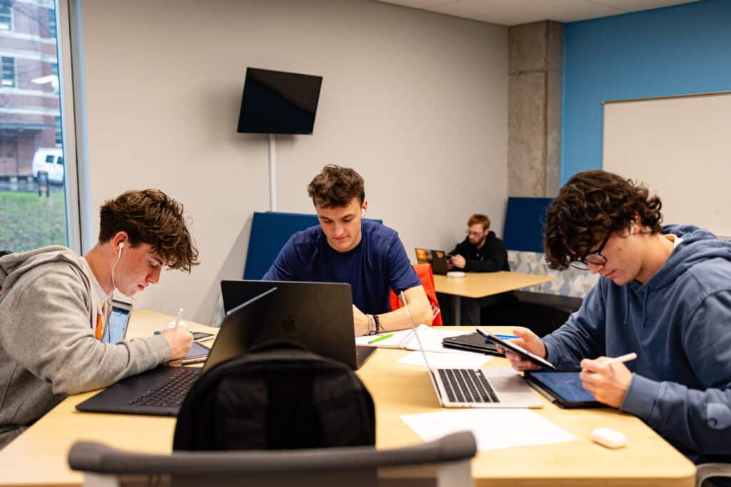 A group of male students studying in Zeanah Engineering Complex