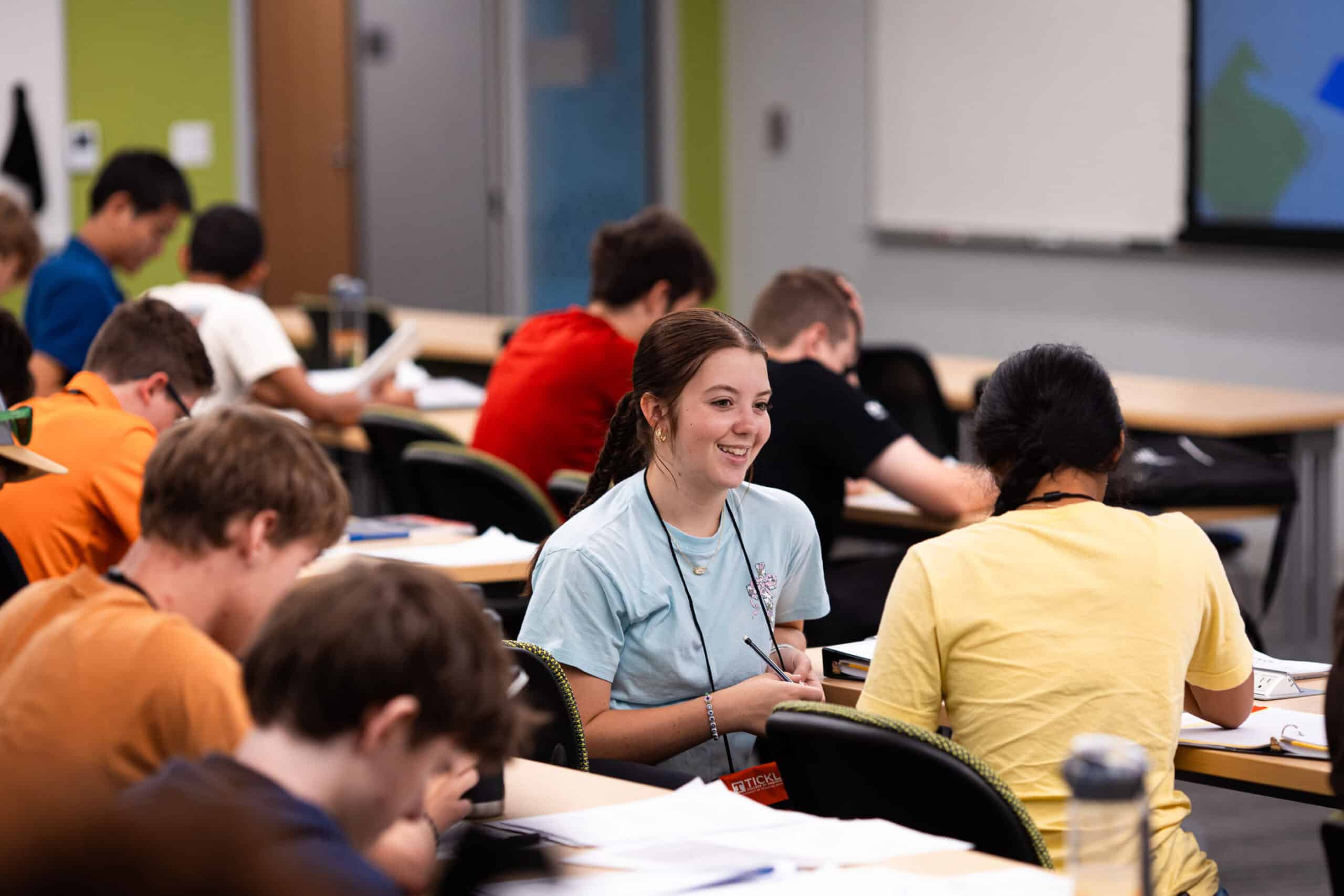 High schoolers talking to each other during the 2026 eVOL10 program